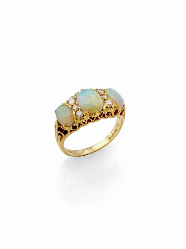 Anello oro giallo e opali