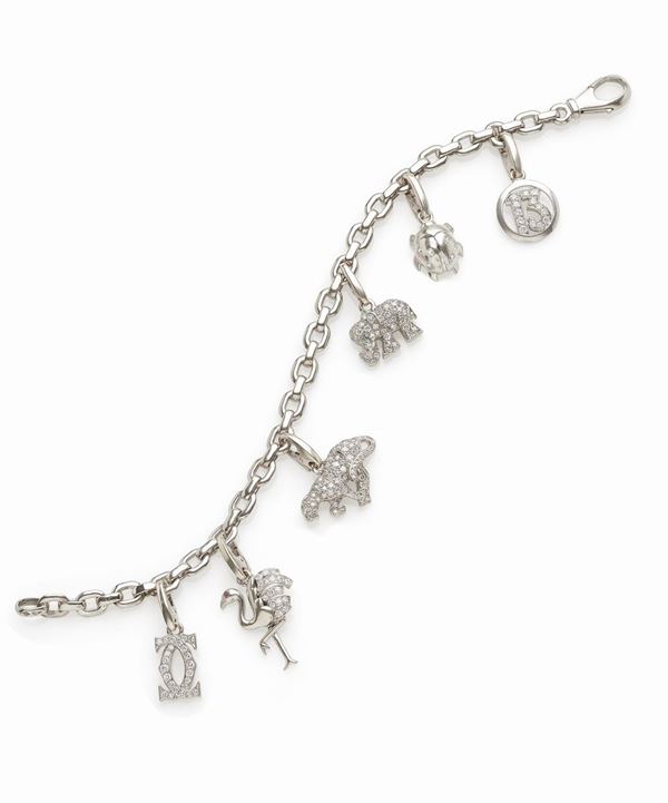 Cartier : Bracciale Cartier in oro bianco con charms  - Auction Gioielli e Orologi del XX Secolo - Faraone Casa d'Aste