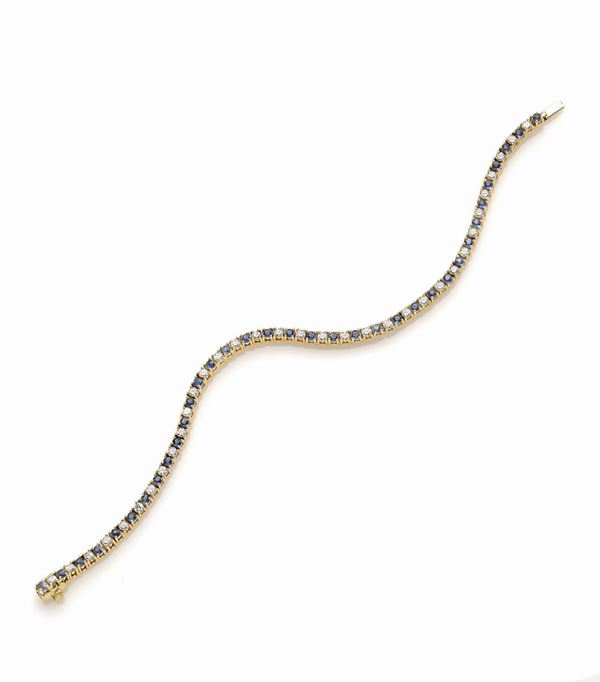 Bracciale tennis in oro con diamanti e zaffiri