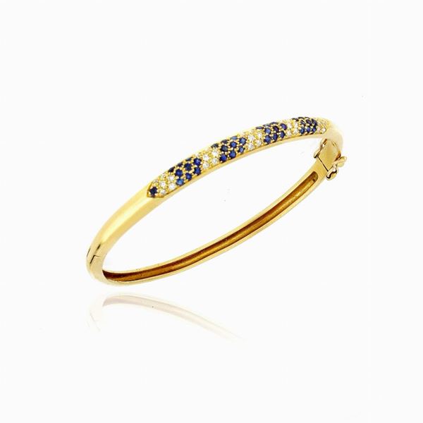 Bracciale rigido in oro con diamanti e zaffiri