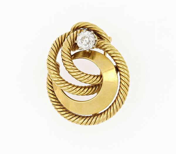 Spilla torchon in oro con diamante