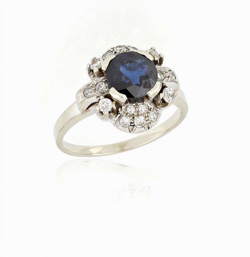 Anello in Oro con Zaffiro e Diamanti