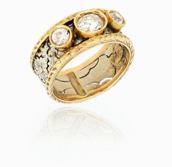 Anello fascia traforata in oro con diamanti