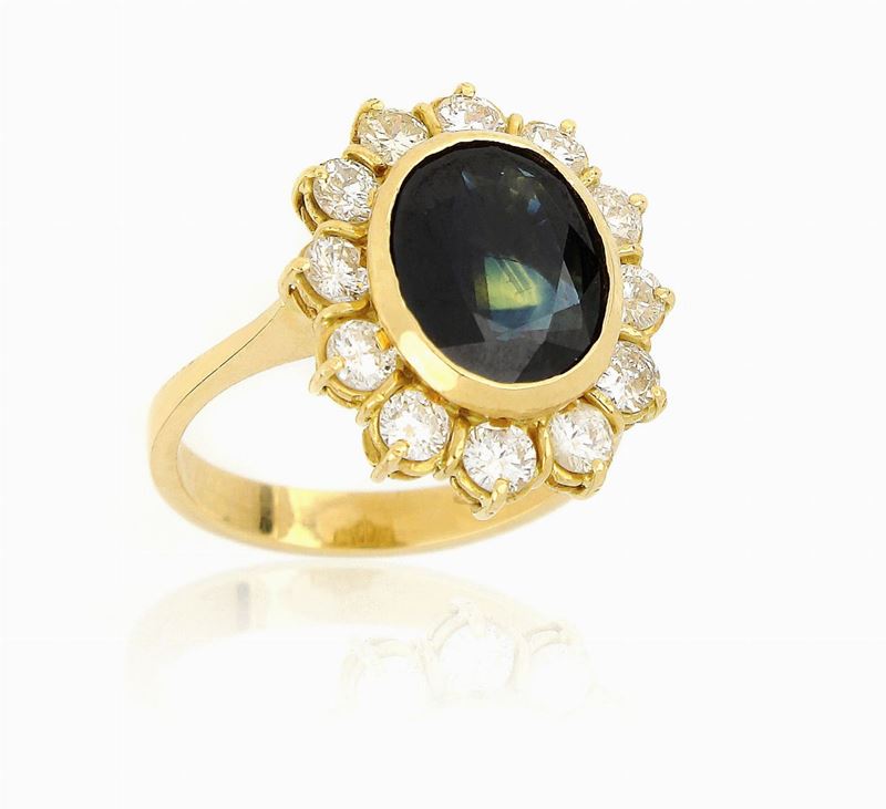 Anello in Oro con Zaffiro e Diamanti