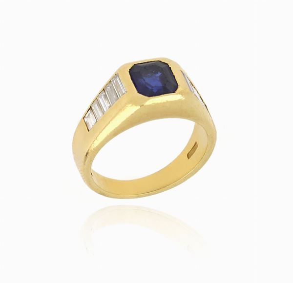 Anello in oro giallo, zaffiro e diamanti