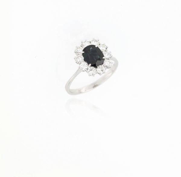 Anello margherita con zaffiro  - Asta PIETRE DURE E SEMIPREZIOSE - Faraone Casa d'Aste