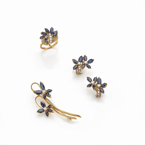 Parure composta da spilla, orecchini e anello in oro