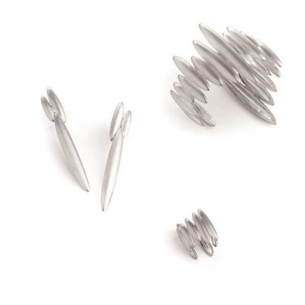 Lotto composto da orecchini, bracciale e anello della collezione Optical Chic, firmati Lucedeimieiocchi.