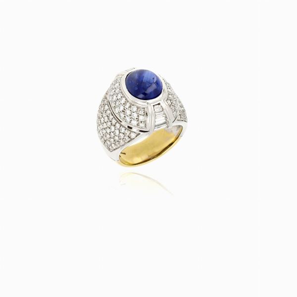 Anello fascia con zaffiro cabochon