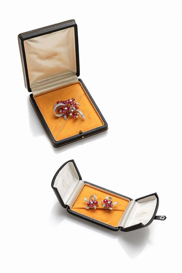 Dem-parure con diamanti e rubini in astucci Fasano 