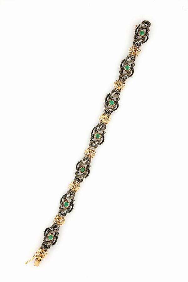 Bracciale traforato con smeraldi 