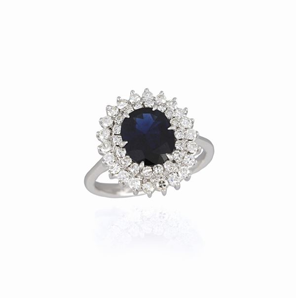 Anello con zaffiro centrale