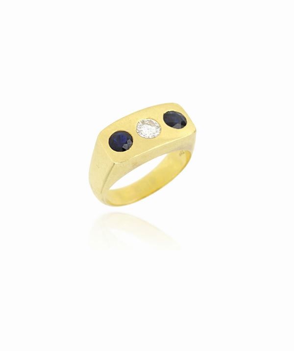 Anello trilogy in oro con diamanti e zaffiri