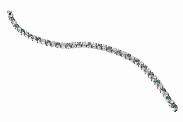 Bracciale tennis con diamanti e smeraldi