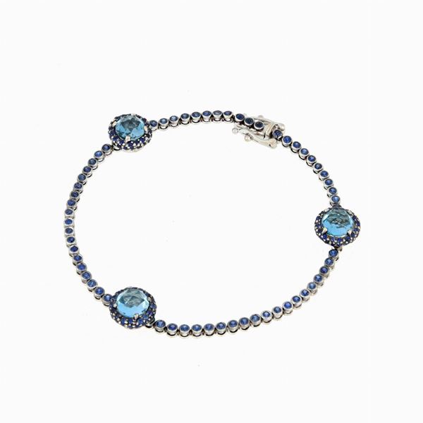 Bracciale tennis con zaffiri e topazi  - Asta GIOIELLI E OROLOGI - Faraone Casa d'Aste
