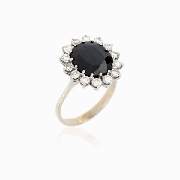 Anello margherita con zaffiro 