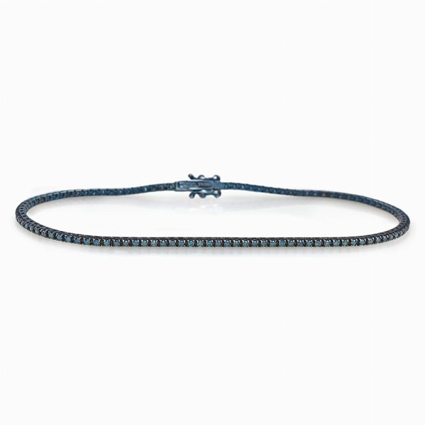 Tennis con diamanti blu