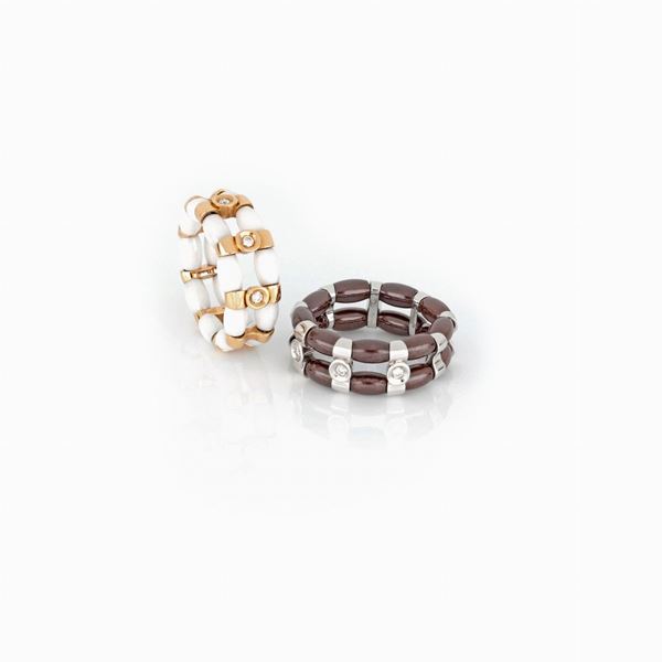 Anelli elastici con dischetti in ceramica, oro e diamanti   - Asta GIOIELLI E OROLOGI - Faraone Casa d'Aste
