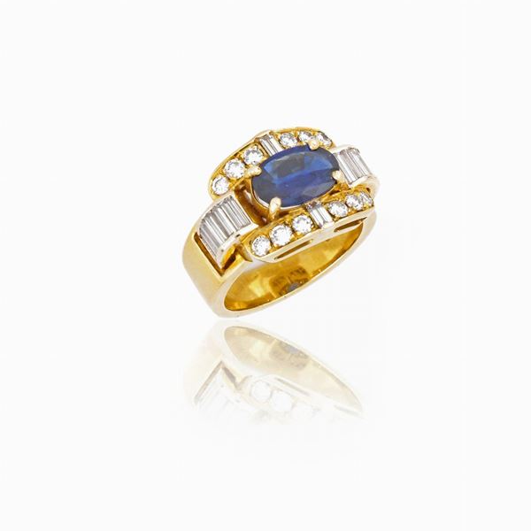 Anello in oro giallo, diamanti e zaffiro  - Asta GIOIELLI E OROLOGI - Faraone Casa d'Aste