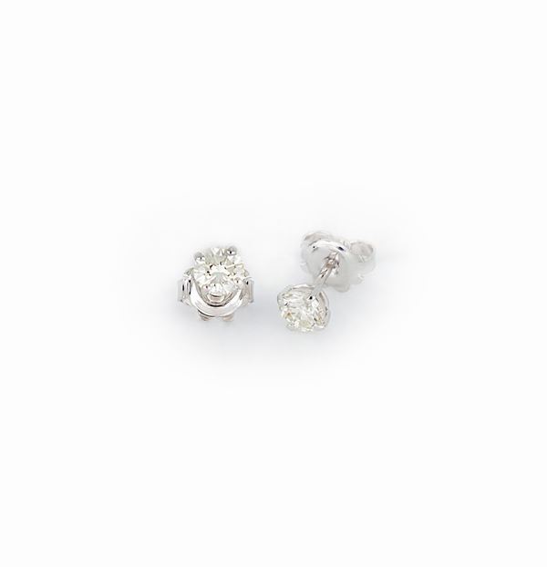 Tappabuchi con diamanti  - Asta GIOIELLI E OROLOGI - Faraone Casa d'Aste