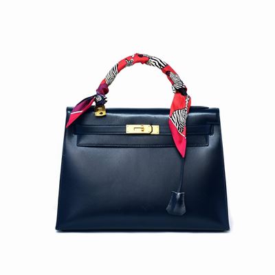 Hermès Kelly 32 con Twilly