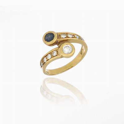 Anello Contrariè con Diamanti e Zaffiro