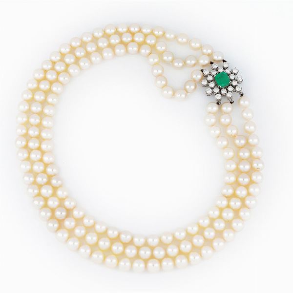 Pearls strands with diamonds and emerald clasp