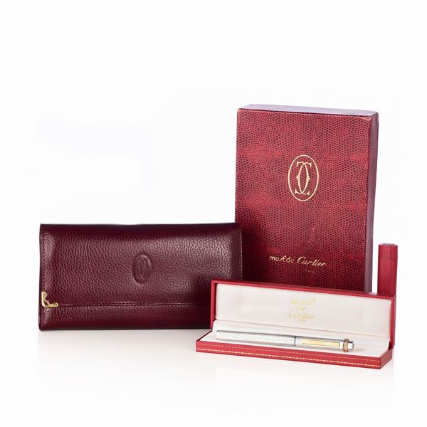 Cartier - Lot composed of Cartier wallet and pen