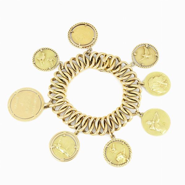 Bracciale in oro giallo con medaglie 
