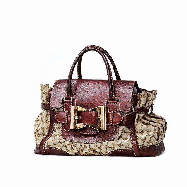 Gucci : Gucci Dialux Queen Bow  - Asta GIOIELLI, OROLOGI E LUXURY GOODS - Faraone Casa d'Aste