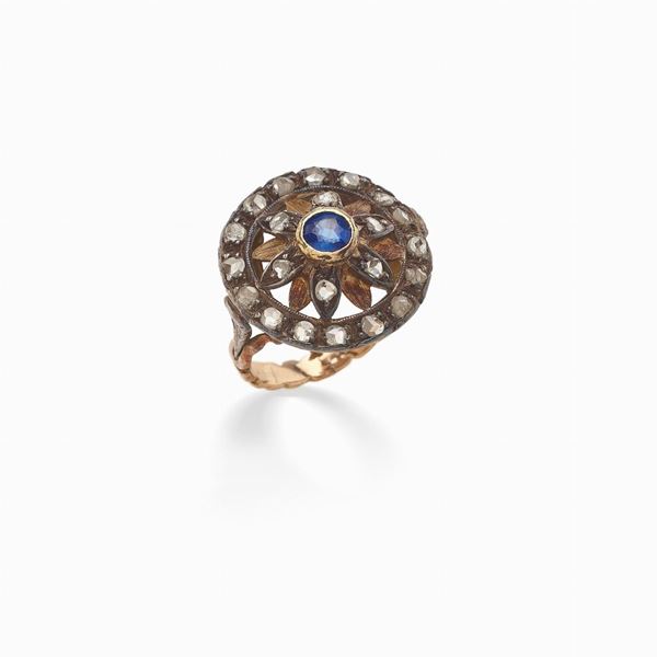 Anello Belle Epoque con zaffiro centrale
