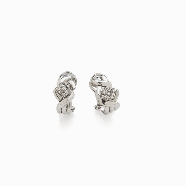 Gold white earring signed Salvini 