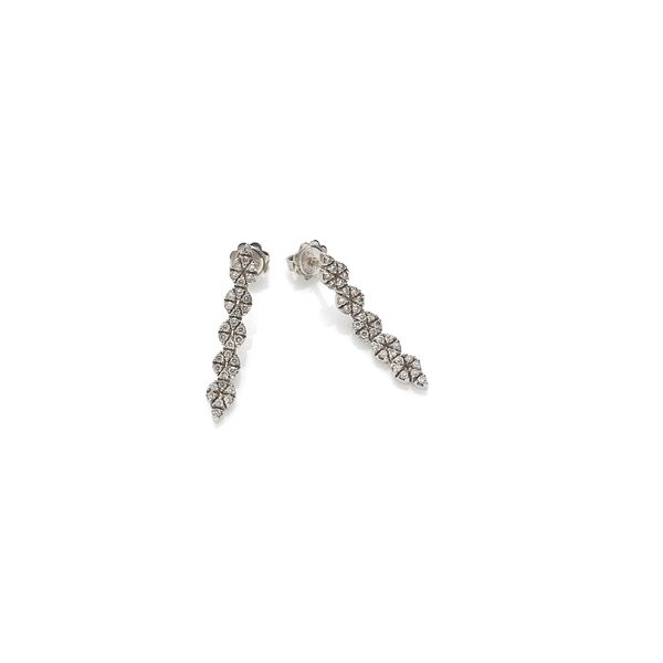 Earrings with articulated modules in white gold and diamonds