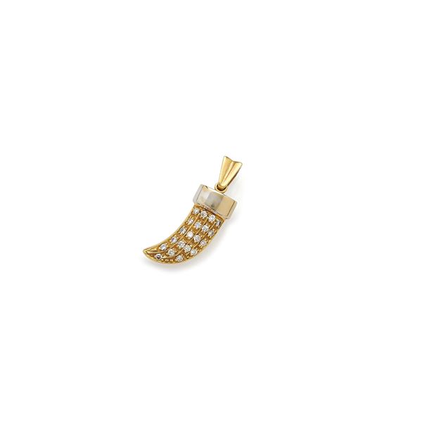 White and yellow gold horn pendant with diamonds