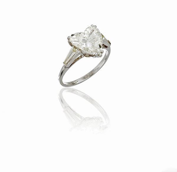 White gold ring with diamond heart