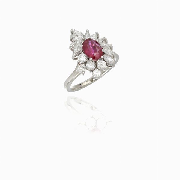 Anello oro bianco con diamanti e rubino centrale