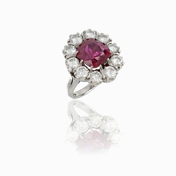 18 carat white gold ring with ruby and diamonds