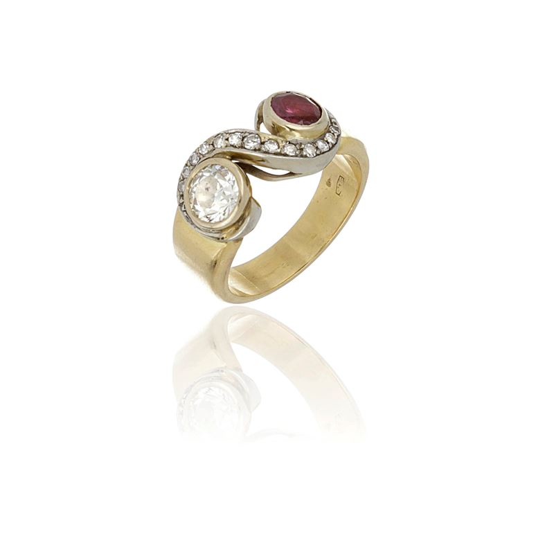 Anello contrariè fascia con rubino circa 0,40ct e diamanti circa 0,84 ct
