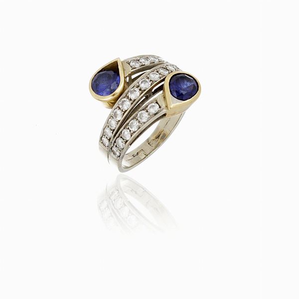 Anello contrariè con zaffiri sintetici e diamanti 