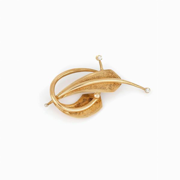 Spilla in oro giallo con diamanti