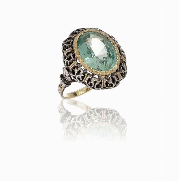 Anello oro e argento con corindone ovale