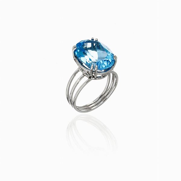 Anello oro bianco e topazio