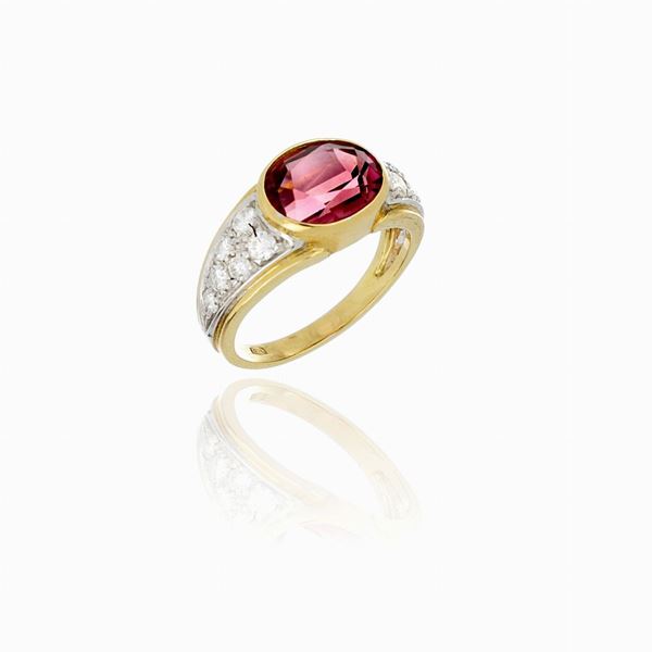 Anello oro giallo diamanti e pietra
