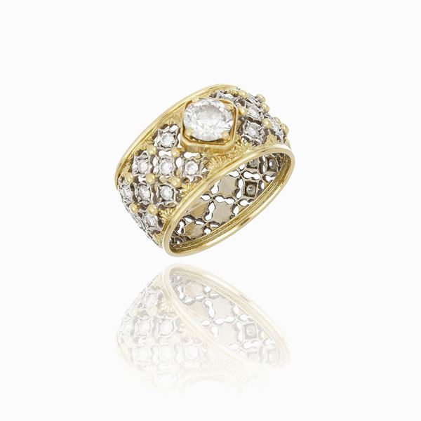 Anello fascia in oro giallo e diamante