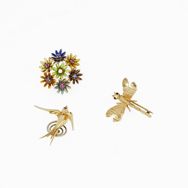 Three gold brooches