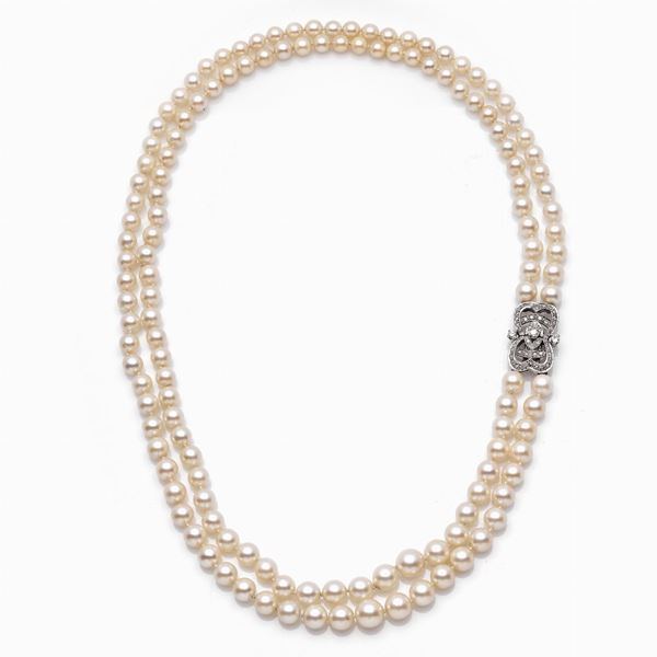Doppio filo perle oro bianco e diamanti