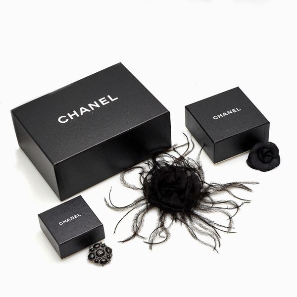 Three Chanel brooches