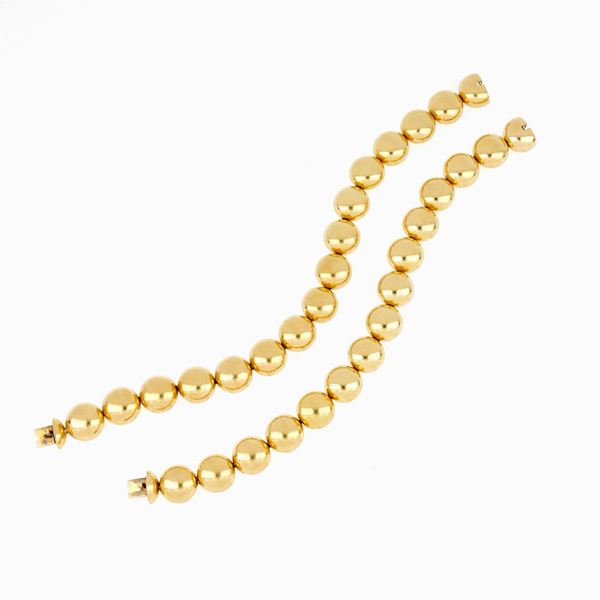 Two gold bracelets 