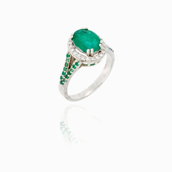 Emeralds and diamonds gold ring 