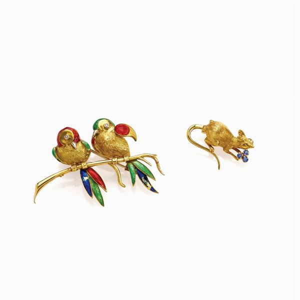 Set composto da due spille in oro 